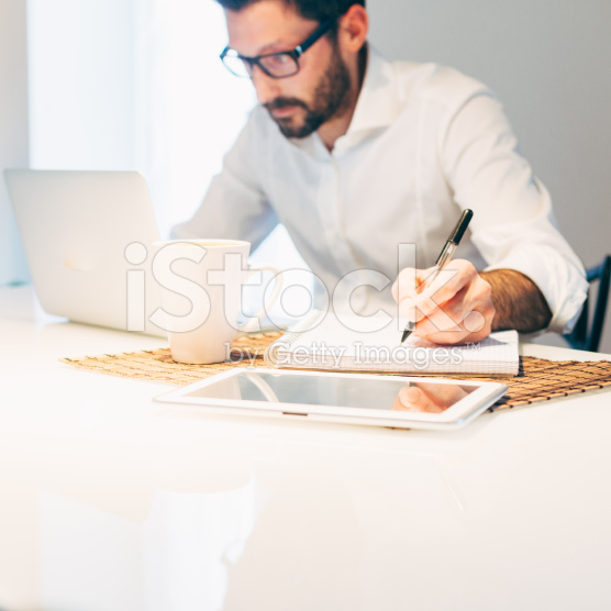 stock-photo-48409582-man-working-using-laptop-at-home