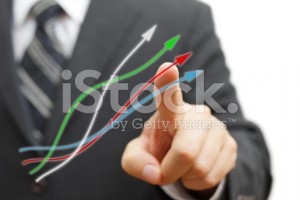 stock-photo-50963140-businessman-touching-growing-arrows-positive-trend-concept