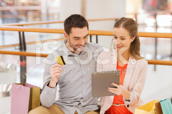 stock-photo-56013000-couple-with-tablet-pc-and-credit-card-in-mall
